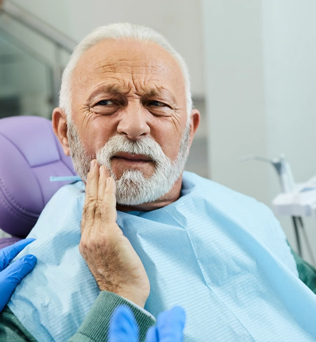 Patient receiving a tooth extraction procedure